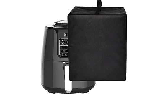 The image shows a neatly organized kitchen counter featuring several stylish air fryer covers.
