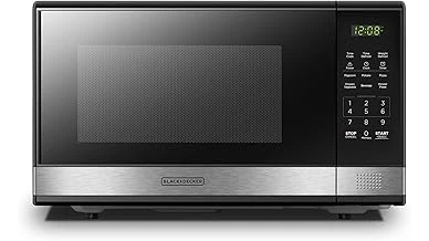 This image shows a selection of sleek, modern mid-size RV microwaves suitable for small spaces.