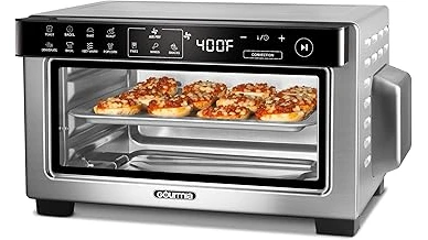 The image shows a modern kitchen counter with a sleek air fryer and toaster oven combination.