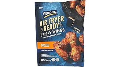 The image shows perfectly golden, crispy chicken wings arranged artfully, ready for a top air fryer.