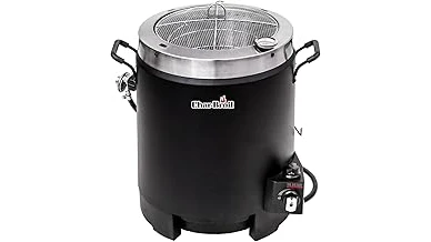 This image shows a perfectly cooked whole turkey in a modern kitchen air fryer.