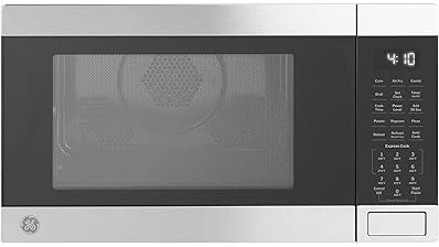 The image shows a collection of sleek, modern kitchen microwaves, likely the top rated general electric models.