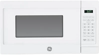 The image shows a sleek, modern microwave installed neatly beneath a kitchen cabinet.
